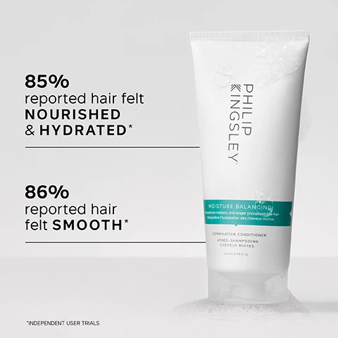 Image 1 - A tube of Philip Kingsley Moisture Balancing Combination Conditioner is displayed, featuring statistics indicating that 85% reported their hair felt nourished and hydrated, and 86% reported their hair felt smooth, with a note stating Independent user trials.
Image 2 - A person holding a tube of Philip Kingsley Moisture Balancing Conditioner, which features key benefits listed alongside it: lightweight yet deeply conditioning, reduces breakage, anti-static formula adds shine and strength.
Image 3 - A woman with long, wet hair being combed with a black comb, accompanied by text that says it leaves my hair HEALTHY, HYDRATED and in really GREAT CONDITION without looking or feeling weighed down, CUSTOMER REVIEW.
Image 4 - A white tube of Philip Kingsley Moisture Balancing Conditioner is displayed, with a turquoise label and visible checkmarks next to the key ingredients: Guar, Silicone, and Hydrolyzed Elastin, each followed by their respective descriptions.
Image 5 - Image shows a side-by-side comparison of a persons hair before and after treatment, with the left side displaying long, straight, and dull hair labeled BEFORE and the right side showing shiny, wavy hair labeled AFTER.
Image 6 - A woman with wet hair is holding two hair care products while standing in a bathroom, with text that reads TRICHOLOGIST TIP: After shampooing, gently work into the mid-lengths and ends of the hair, avoiding the roots. Rinse well.