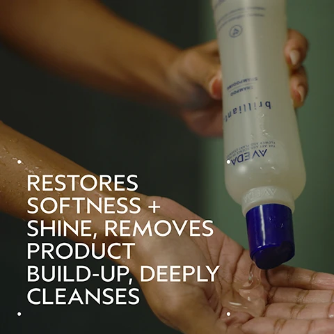 Image 2 - A persons hands, with one hand pouring clear liquid from a brilliant shampoo bottle by AVEDA, which states THE ART AND SCIENCE OF FLOWER AND PLANT ESSENCES, into the other hand, with overlay text that reads RESTORES SOFTNESS + SHINE, REMOVES PRODUCT BUILD-UP, DEEPLY CLEANSES. Image 3 - A split image shows a woman with dark, voluminous, curly hair on the left and the same woman with dark, straight, smooth hair on the right, smiling in both panels. Text reads: BEFORE, AFTER, Unwashed Hair, Results with Brilliant Shampoo, Conditioner, Damage Control Retexturing Gel, Anti-Humectant Pomade and Medium Hold Hair Spray and Smooth Infusion™ Perfectly Sleek Styling Crème. Blow dried with brush. Image 4 - A dark green image displays a white circle filled with pink rose petals, a white jasmine flower, and scattered dark brown clove buds, alongside the text Blissful Pure-Fume Aroma and An aromatic blend with jasmine, rose, certified organic clove and other pure flower and plant essences. Image 5 - The image shows How to Use Brilliant hair products in a four-step routine: 01 Cleanse, with hands massaging Brilliant™ Shampoo into wet hair; 02 Condition, with hands squeezing Brilliant™ Conditioner into a palm; 03 Prep, with hands spraying Brilliant™ Damage Control onto wet hair; and 04 Style, displaying Brilliant™ Anti-Humectant Pomade and Medium Hold Hair Spray and Smooth Infusion™ Perfectly Sleek products. Image 6 - A clear gel-like liquid with many air bubbles and a dense white foam on one side is shown on a white background. Image 7 - A split image shows a woman with dark curly hair, on the left her hair appears frizzy and unstyled, and on the right her hair is smooth, shiny, and well-defined; the visible text reads BEFORE, AFTER, Unwashed Hair, Results with Brilliant Shampoo, Conditioner, Damage Control, Retexturing Gel, Humectant Pomade, Hair Spray, and Wooden Paddle Brush. Blow dried with diffuser attachment. Image 8 - Three white certification logos, including 100% VEGAN, Certified B Corporation, and Cruelty Free INTERNATIONAL, are displayed against a background of dark green tropical leaves with lighter green stripes.