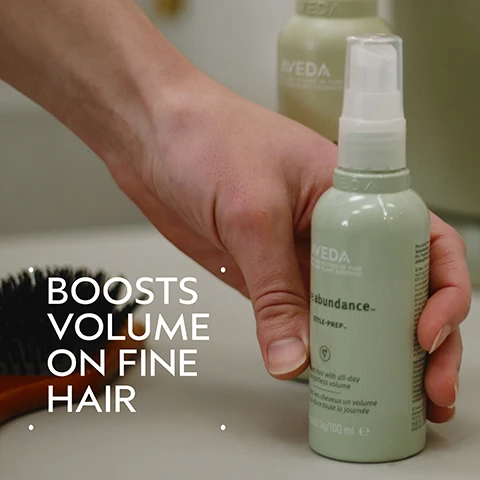 Image 2 - A hand holds a light green spray bottle labeled Aveda pure abundance STYLE-PREP, with text Boosts Volume on Fine Hair, fine hair with all-day weightless volume, and 3.4 fl oz liq/100 ml visible, and a hairbrush and another Aveda bottle in the background. Image 3 - An image with a dark green background features a large circular graphic containing blurred, flowing abstract shapes in shades of teal, blue, and light green, with the white text Acacia Gum Blend at the top and Helps Fill Out Fine Hair at the bottom. Image 4 - A before-and-after split image shows a woman with shoulder-length light brown hair; on the left, her hair appears flat, and on the right, it is noticeably more voluminous and styled, with visible text BEFORE, Unwashed Hair, AFTER, and Results with Pure Abundance™ Volumizing Shampoo, Volumizing Clay Conditioner, Style-Prep™, and Volumizing Hair Spray, Phomollient™ Styling Foam. Blow dried with Mini Wooden Paddle Brush. Image 5 - A hair care instruction guide on a dark green background, featuring four circular images: first, hands washing hair with suds; second, conditioner being squeezed from a bottle into a hand; third, a woman brushing styling foam into her wet hair; and fourth, a woman spraying hairspray. HOW TO USE 01 CLEANSE Pure Abundance™ Volumizing Shampoo 02 CONDITION Pure Abundance™ Volumizing Conditioner 03 STYLE Pure Abundance™ Style-Prep™ Phomollient™ Styling Foam & Mini Paddle Brush 04 HOLD Pure Abundance™ Volumizing Hair Spray. Image 6 - A split image shows a womans shoulder-length, reddish-brown hair from the back, comparing flat, unwashed hair on the left with voluminous, styled hair on the right. BEFORE AFTER Unwashed Hair Results with Pure Abundance(TM) Volumizing Shampoo, Volumizing Clay Conditioner, Style-Prep(TM), and Volumizing Hair Spray, Phomollient(TM) Styling Foam. Blow dried with Mini Wooden Paddle Brush. Image 7 - A dollop of translucent, pale yellow liquid with a few small bubbles is spread on a white surface. Image 8 - Three white certification logos are displayed on a dark green leafy background, reading from left to right: a circular 100% VEGAN logo with a V symbol, a Certified B Corporation logo, and a Cruelty Free International logo featuring a leaping rabbit.