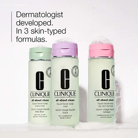 Image 1 - Three bottles of Clinique liquid facial soap are displayed with pink and green caps, featuring labels that read all about clean and different skin type formulations; visible text states Dermatologist developed. In 3 skin-typed formulas.
Image 2 - A white plate displays three sugar cubes and a smear of a light-colored, cream-like substance, with the word Sucrose positioned at the top right.
Image 3 - A light green, bubbly substance with the words clean and refresh displayed alongside symbolic icons.
Image 4 - A light green background with a table listing Free of followed by two items marked with an X: fragrance and drying alcohol.