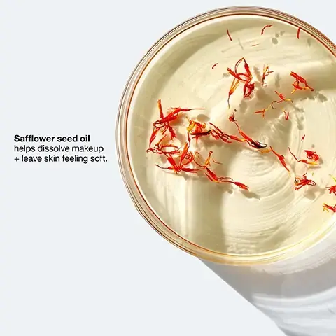Image 1 - A clear container filled with creamy, light-colored product topped with red safflower petals, accompanied by the text Safflower seed oil helps dissolve makeup + leave skin feeling soft.
Image 2 - An abstract image of white cream textured against a light background with the text dissolve long-wearing makeup prominently displayed.
Image 3 - A close-up view of a glass container with a blurred liquid inside, next to a list of items marked with an X indicating they are free of fragrance, gluten, drying alcohol, sodium lauryl sulfate, and sodium laureth sulfate. Image 4 -  Image of a Clinique skincare product display featuring a purple cleansing balm and a purple facial cleansing mousse alongside text that describes their benefits; visible text includes Our ultimate double cleanse, Take The Day Off. Every night, Step 1 Cleansing Balm Melts away tough face, eye, and lip makeup, SPF, and pollution, Step 2 Facial Cleansing Mousse Rinses away face makeup, dirt, oil and other impurities, and the Clinique logo.