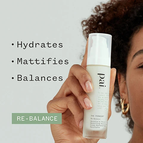 Image 1 - A person with curly hair holds a bottle of skin moisturizer labeled Pai, with visible text listing benefits: Hydrates, Mattifies, Balances, and the words RE-BALANCE at the bottom.
Image 2 - A skincare product bottle with a white pump top is displayed against a green background, featuring a review quote stating a user found it effective in managing oily areas while keeping the skin moisturized, along with a star rating and certification logos for organic and vegan.