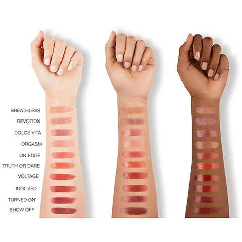 Image 1, swatches on three different skin tones - breathless, devotion, dolce vita, orgasm, on edge, truth or dare, voltage, idolized, turned on, show off. Image 2, colour meets care, 8 hour hydration, high shine finish, long lasting wear. Image 3, monoi hydrating complex = a moisturizing blend of ingredients provides long lasting comfort. shea butter = forms a nourishing barrier around lips to retian moisture levels for 8 hoour hydration. mango butter = helps smooth dry lips with an anti aging effect. Image 4, breathless pink nude.
