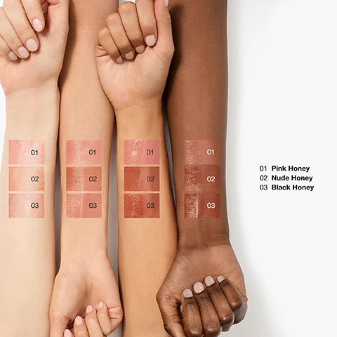 Image 1 - Four arms with diverse skin tones display three vertically arranged rectangular swatches of a glossy product, each labeled with a number from 01 to 03, alongside a legend reading 01 Pink Honey 02 Nude Honey 03 Black Honey. Image 2 - Three lipsticks in silver tubes are stacked vertically on a white background, with honey dripping around them, labeled from top to bottom as Black Honey for a dark reddish-brown shade, Pink Honey for a rosy pink shade, and Nude Honey for a light brown shade.
