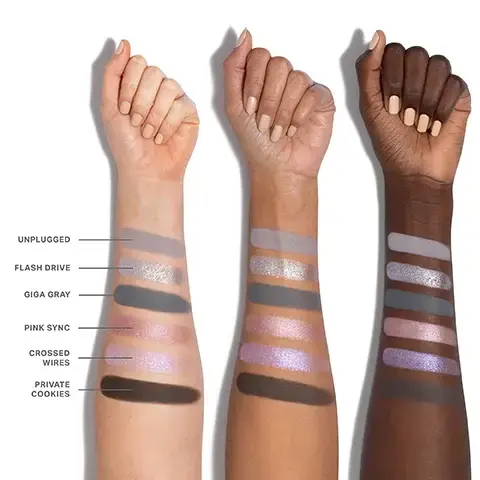 Image 1 - Three arms with varying skin tones are shown displaying swatches of makeup colors labeled as Unplugged, Flash Drive, Giga Gray, Pink Sync, Crossed Wires, and Private Cookies.
Image 2 - An arrangement of six piles of colored powder, including shades of gray, pink, and silver, labeled with numbers 01 to 06 and corresponding names: Unplugged, Flash Drive, Giga Gray, Pink Sync, Crossed Wires, and Private Cookies.
Image 3 - Close-up of a womans eye showcasing shimmery silver and pink eyeshadow, long eyelashes, and neatly groomed eyebrows, with swatches labeled 04 and 05 visible in the lower left corner.
Image 4 - A close-up of a womans eye showcasing a dramatic eyeshadow look featuring shades of silver and gray, with a hint of shimmer, and color swatches labeled 01, 02, 03 displayed at the bottom.
Image 5 - Image of several crushed makeup powders in muted shades, with descriptive text highlighting the benefits of the Chromaplus blend: pigment-packed performance, all-day creaseproof wear, and luxurious blendability and buildability.
Image 6 - A visually appealing image showcasing three compact eyeshadow palettes from Morphe, with vibrant shades and textures, accompanied by text that reads INFINITE BUT COMPACT CURATIONS, NEXT-GEN FORMATS Choose from 6- or 12-pan palettes—designed for any mood and every moment, ENDLESS EXPRESSION Build versatile looks with timeless and trending shades, and READY WHEN YOU ARE Apply on the go with a built-in mirror.
Image 7 - Image features three sections showcasing different cosmetic finishes: the top section labeled SEAMLESS MATTES shows a light brown matte powder, the middle section labeled LUMINOUS SHIMMERS displays a pink shimmery powder, and the bottom section labeled ULTRAREFLECTIVE MOLTEN METALS features a metallic pink substance, with descriptions of each finish below the respective labels.Image 8 - A swatch of pink metallic eyeshadow and an open palette with six eyeshadow pans, one showing a split view of the metallic shade applied dry and wet, with the Morphe logo, and the text MEET MOLTEN METAL EYESHADOW Exclusive formula-flexing shadow in ChromaPlus 6-Pan Eyeshadow Palettes Apply dry for luminous effects Apply wet for molten-like shine Just spray your brush tip with Continuous Setting Mist before picking up and gliding along lash lines or creases MORPHE M.
