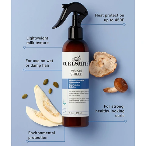 Image 1 - A brown spray bottle of Curlsmith Miracle Shield is centered on a light blue background, surrounded by two mushrooms, two slices of white melon, and green pumpkin seeds, with additional text labels: Lightweight milk texture, For use on wet or damp hair, Environmental protection, Heat protection up to 450F, For strong, healthy-looking curls, and on the bottle: CURLSMITH, MIRACLE SHIELD, Heat And Environmental Protection Spray, Spray Protecteur De Chaleur, shiitake mushroom, guava, prickly pear, pumpkin seed, broccoli leaf, squalane, champignon shiitake, goyave, figue de barbarie, graine de courge, feuille de chou frisé, squalane, Vegan, 8 fl oz 237 mL. Image 2 - The image displays two brown spray bottles of Curlsmith Miracle Shield Heat and Environmental Protection Spray, with the bottle on the left featuring an old lavender label and the bottle on the right showcasing a new blue label, separated by a blue arrow pointing right, and a blue circle in the top right corner indicating Same Great New Look Product.